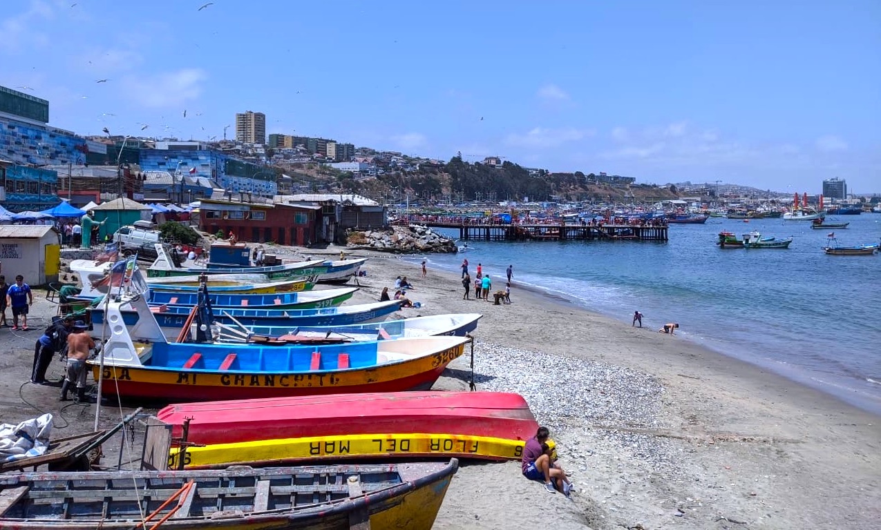 Boats arranged on the beach in Paita, Peru.